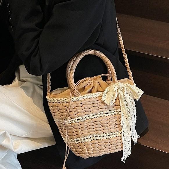 New Woven Bag Women's Spring Niche Design Portable Bucket Bag Crossbody Shoulder Straw Bag