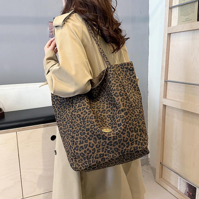 Mote leopardtrykk lerretsveske dame 2025 ny trend mote college-stil tote bag avslappet retro skulderveske