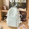 School bag for girls, simple junior high school backpack, fresh forest style for high school students, large-capacity backpack double shoulder bag