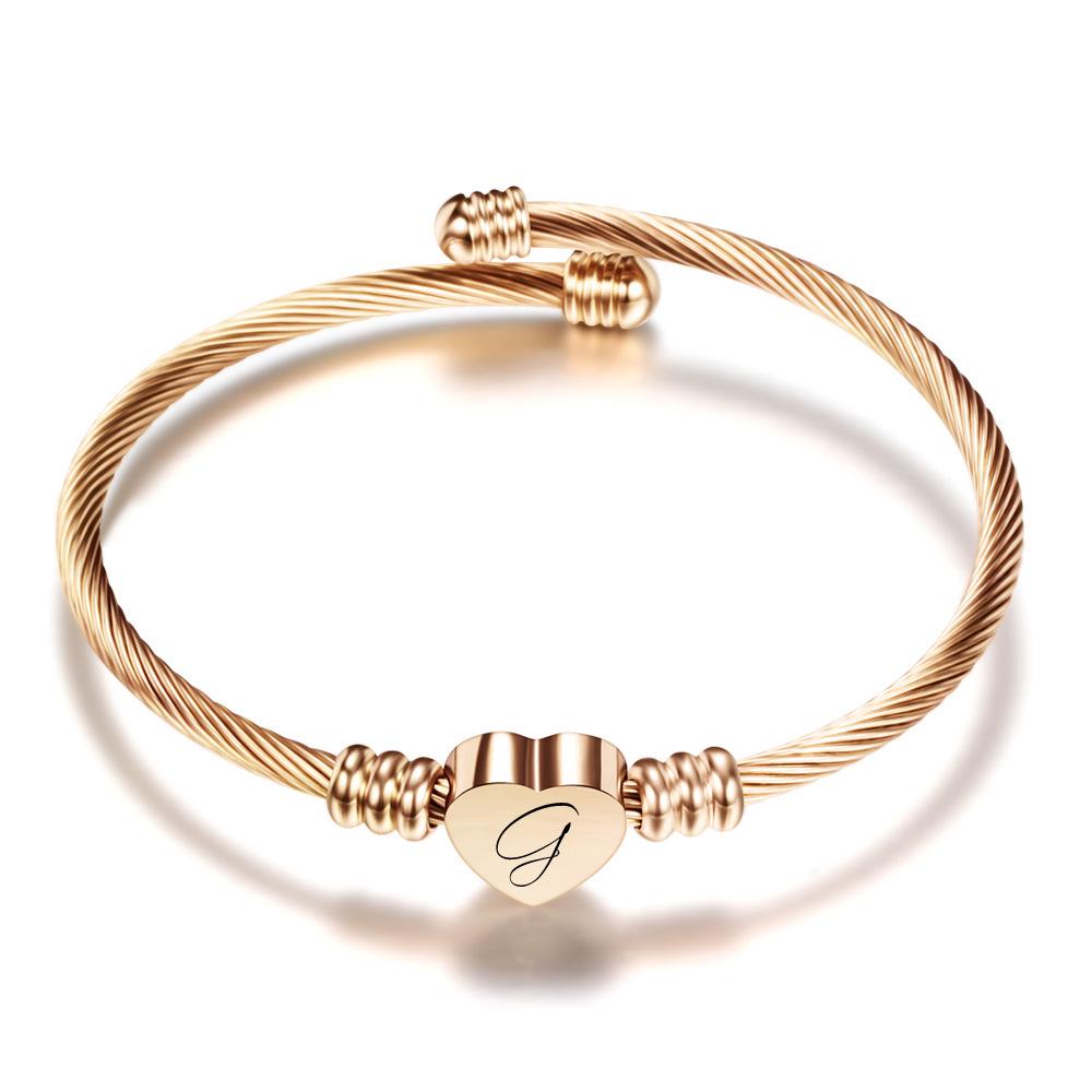 Stylish Women's Bracelet: Stainless Steel Peach Heart with Braided Cable and European-American 26 Letters Design