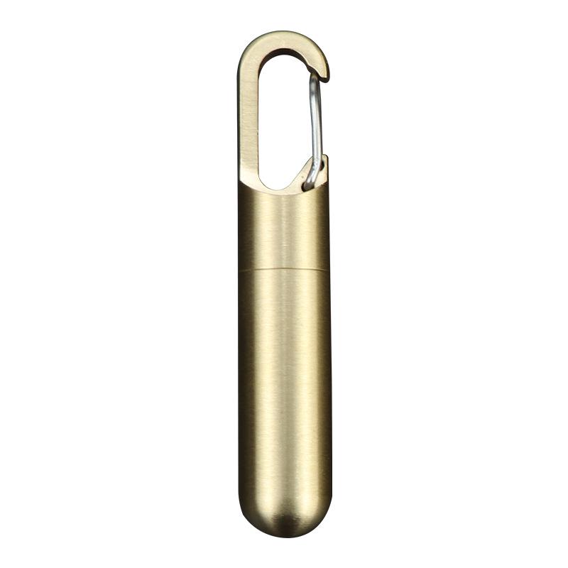 Compact Brass Pill Bottle: Waterproof, Dustproof, Moisture-Proof Storage Jar with Key Hook - Ideal for Travel or Everyday Use.