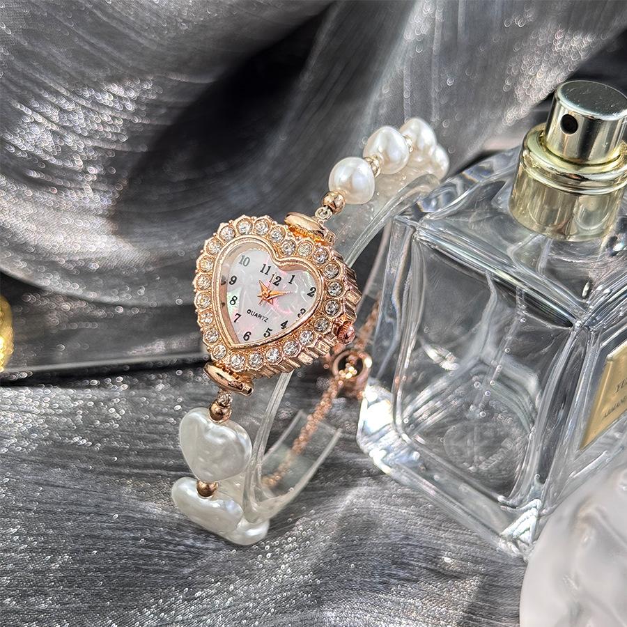 

Любовь Инкрустированные бриллиантами женские часы Полностью бриллиантовые Персиковое сердце Цифровые Жемчужные Двойное заклинание Браслет-часы розового золота