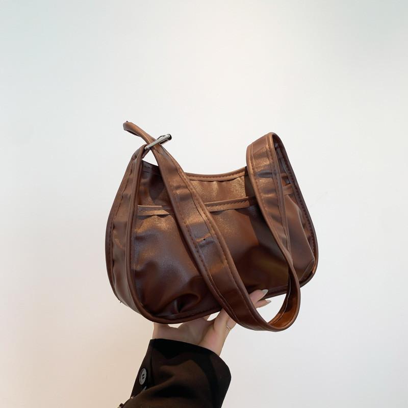 

Fashionable New Moon Bag With Soft Pu Material And Stylish Stitching For Everyday Use коричневий