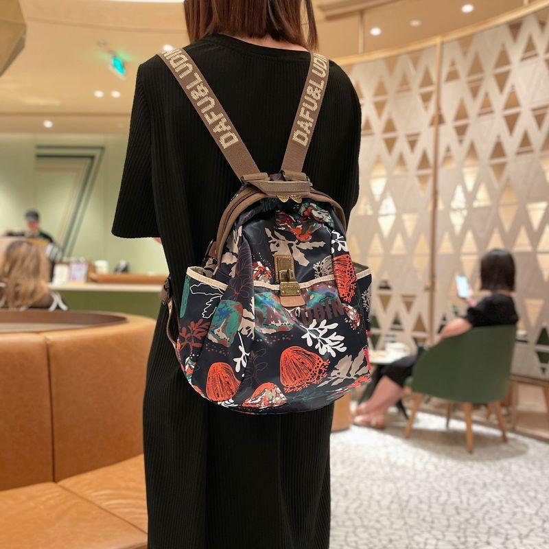 

Lightweight Fashion Travel Backpack Women s 2025 New Arrival Western Style Women s Backpack Good-looking Super Hot out Waterproof Big Medium [Seaweed Flower]]