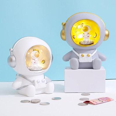 1pc Cute Creative Children Astronaut Piggy Bank Cartoon Anime Spaceman Vinyl Coin Banknote Piggy Bank Gift Money Safe Home Decor