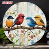D Flat  A Round Print Poster Showcasing a Single Piece of Vintage Metal Signage with Four Colorful Birds Perched On a Wooden B