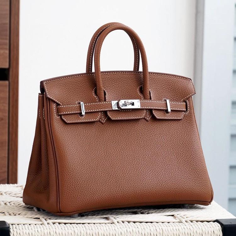 Høykvalitets spesiallaget semi-vokset tråd semi-håndsøm stålbeslag importert togo toppnarvet kuskinn håndveske med en følelse av luksus