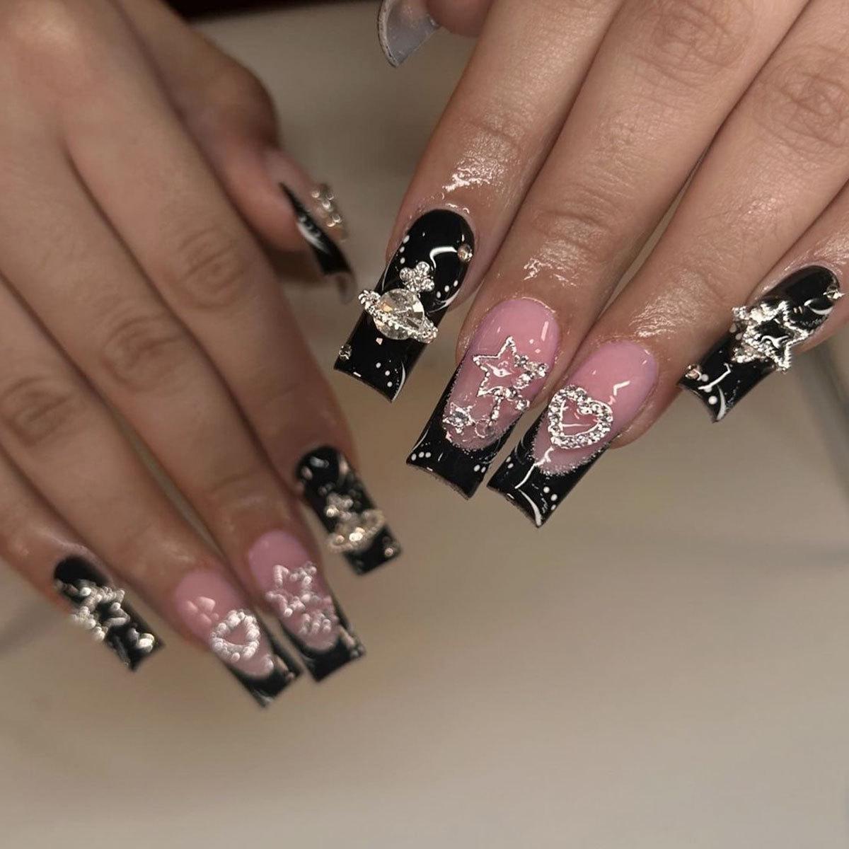 

Medium-Long Black French Edge Removable False Nails with 3D Stars, Hearts & Planets.