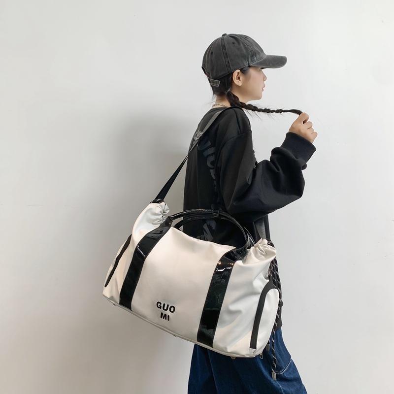 Travel bag Portable yoga fitness bag Large capacity business trip boarding storage bag Student accommodation Small luggage bag