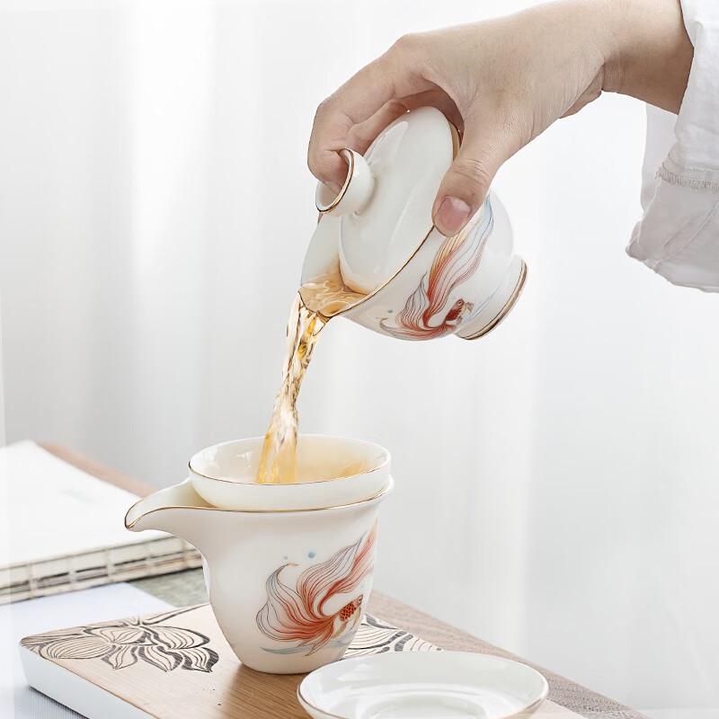 Zisha Tea Set with Gold-Inlaid Jade Design