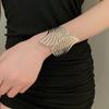 Trendy European & American Exaggerated Metal Hollow Armlet: Niche High-End Women's Jewelry