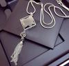 Luxury Non-Fading Korean Fashion Sweater Necklace: Autumn/Winter Women's Niche Design Pendant
