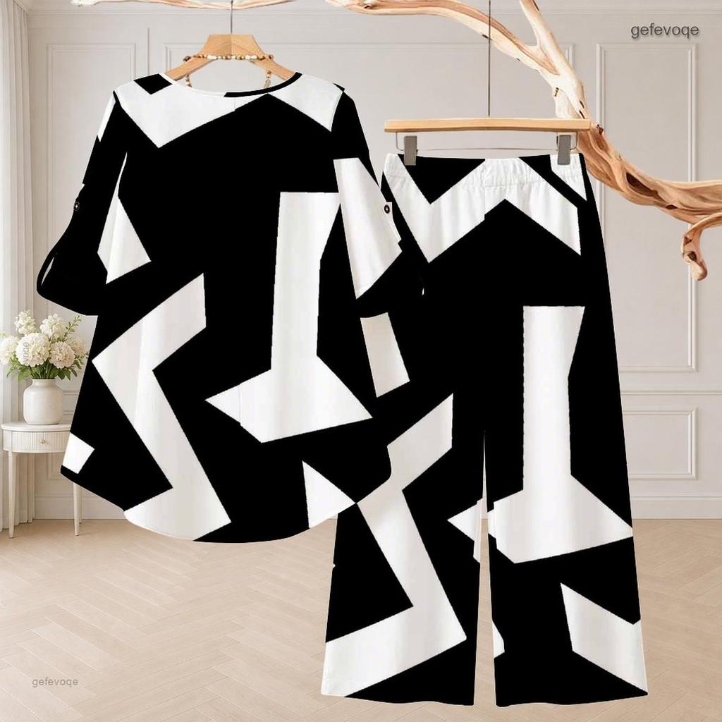 Women Plus Size Two Piece Pant Set Round Neck Half Sleeve Black White Printed High Low Top Wide Leg Pants