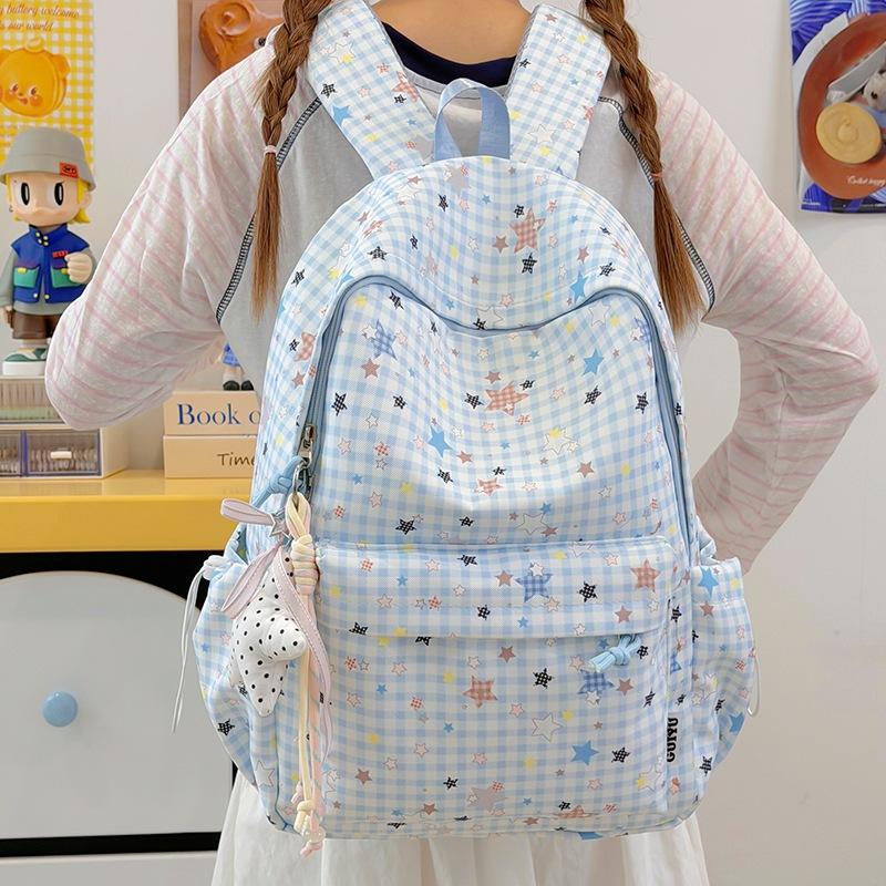 Schoolbag new schoolbag female junior high school student star printing Korean version niche ins backpack Mori college student computer bag