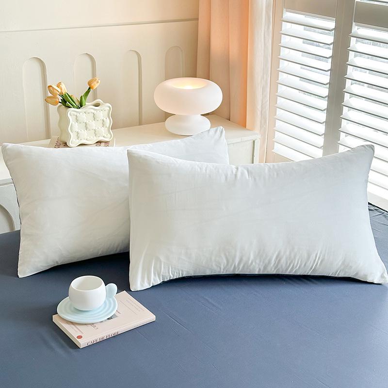 Solid Color Sanded Bedding Set: Four-Piece Set with Quilt Cover and Washed Spring Sheets.