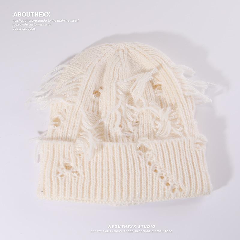 

Корейская уличная мода Универсальная шапка для женщин Осень и зима Ажурная вязаная шапка Защита ушей Холодная шапка Теплая шерстяная шапка M（56-58cm）