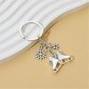 Elegant Silver Ice Skating And Snowflake Pendant Keychain For Winter Sports Enthusiasts Stainless Steel Key Holder