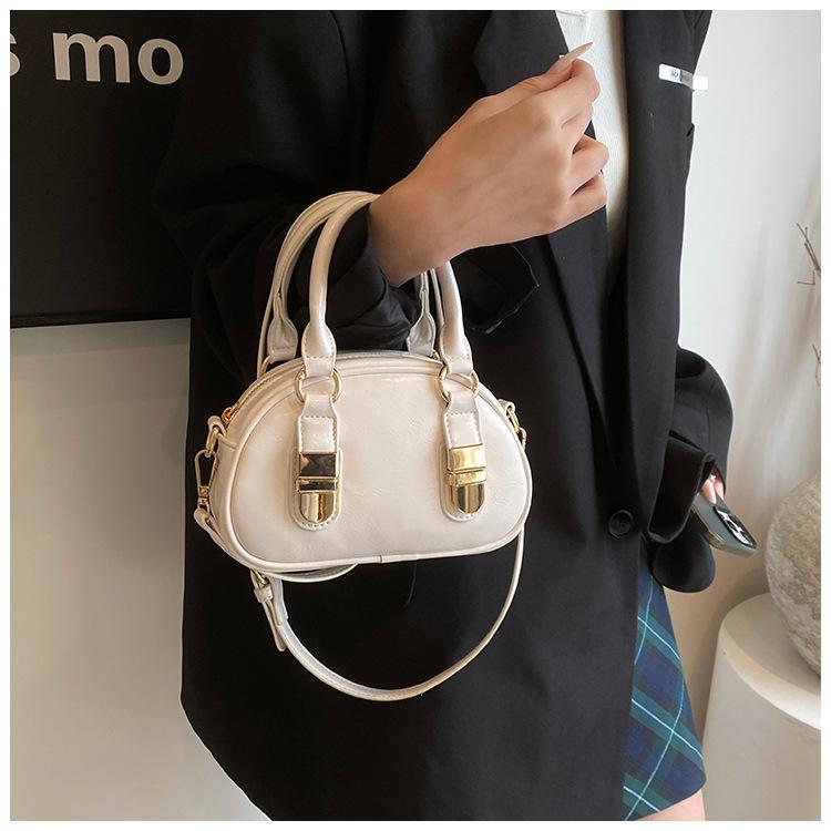 Strukturierte tragbare kleine quadratische Tasche Damen neue Frühjahrs- und Sommermode Schulter-Umhängetasche Tide