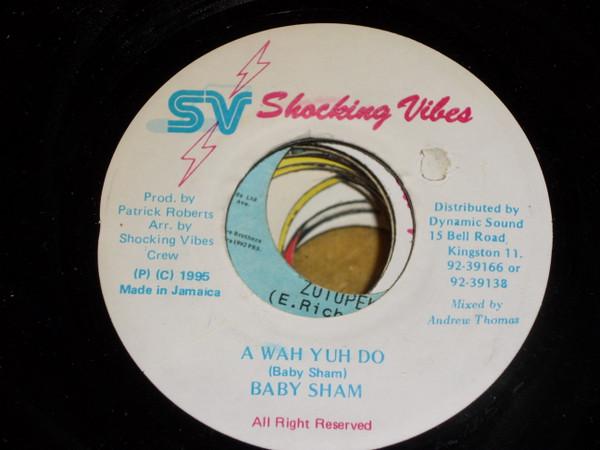 

7-дюймовая пластинка BABY CHAM - A Wah Yuh Do NONE Shocking Vibes 1995 Ямайка Регги, Ска и Даб Б/У