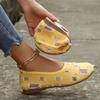 Large size hollow soft-soled cloth shoes spring and summer new casual flat-soled single shoes one pedal breathable shallow-mouth Doudou shoes