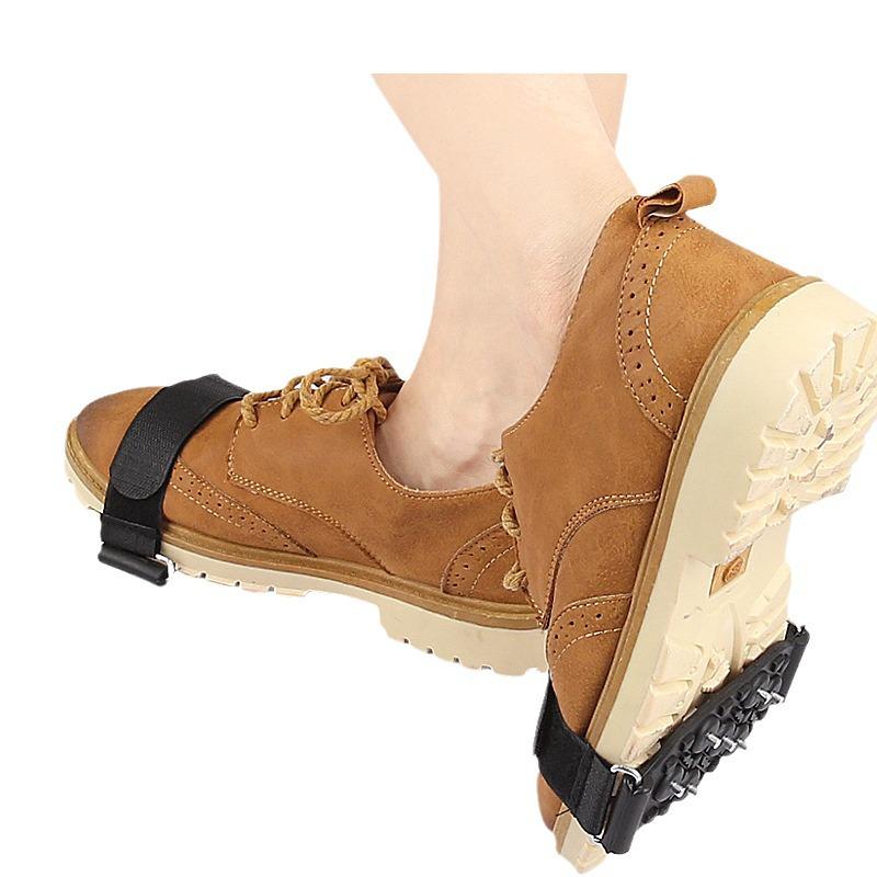 Adjustable Outdoor 7-Tooth Ice Cleats: Portable Anti-Slip Shoe Covers for Travel and Mountaineering.