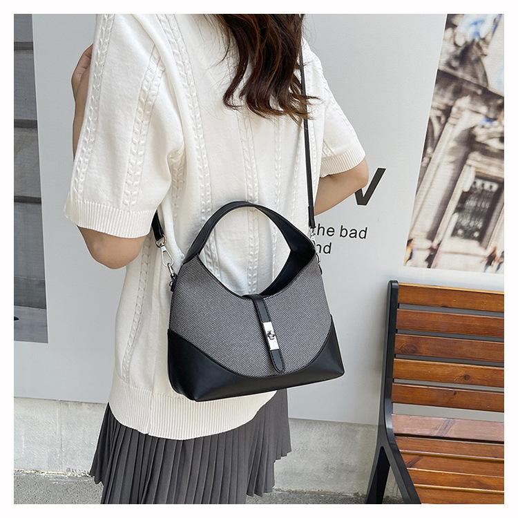 High-end contrasting color niche design bag women's new versatile commuter portable shoulder messenger women's bag