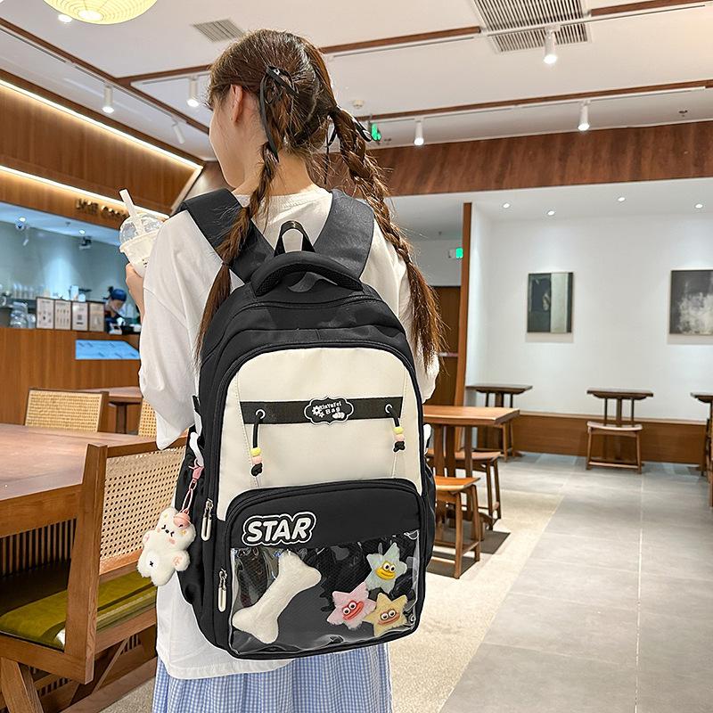 Small fresh contrasting color schoolbag niche design casual versatile children's backpack high value light burden reduction shoulder