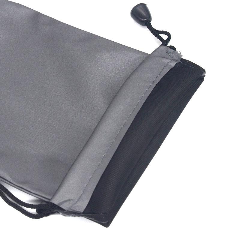Waterproof Gray Drawstring Bag for Power Bank, Phone, Hard Drive, and Selfie Stick.