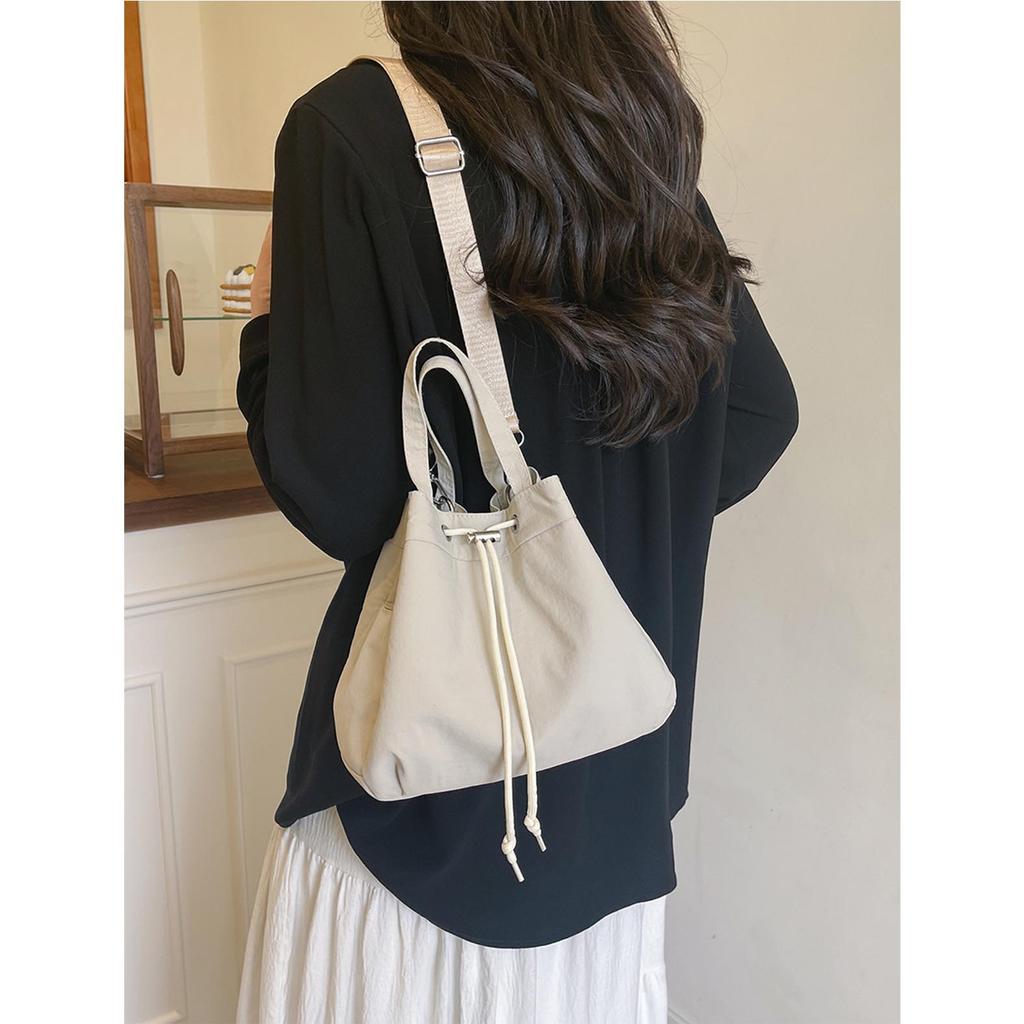 Casual Niche Drawstring Hand-held Bucket Bag Crossbody Bag for Women 2026 New Trendy Versatile Simple Small Bag Cloth Bag