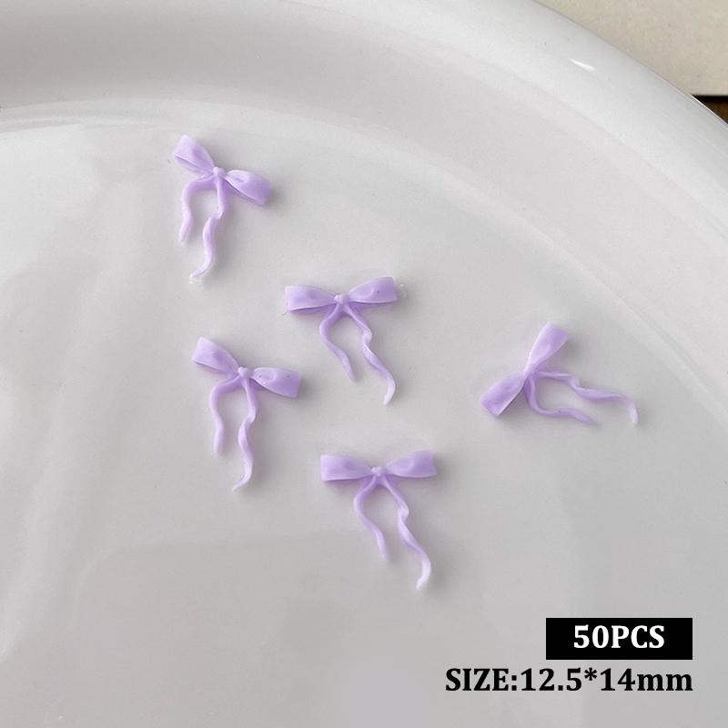 

50 шт. Хвилясті стрічкові бантики Прикраси для нігтів Одноколірні бантики Смоляні прикраси для нігтів для DIY шпильок для волосся, нігтів, деталі фіолетовий