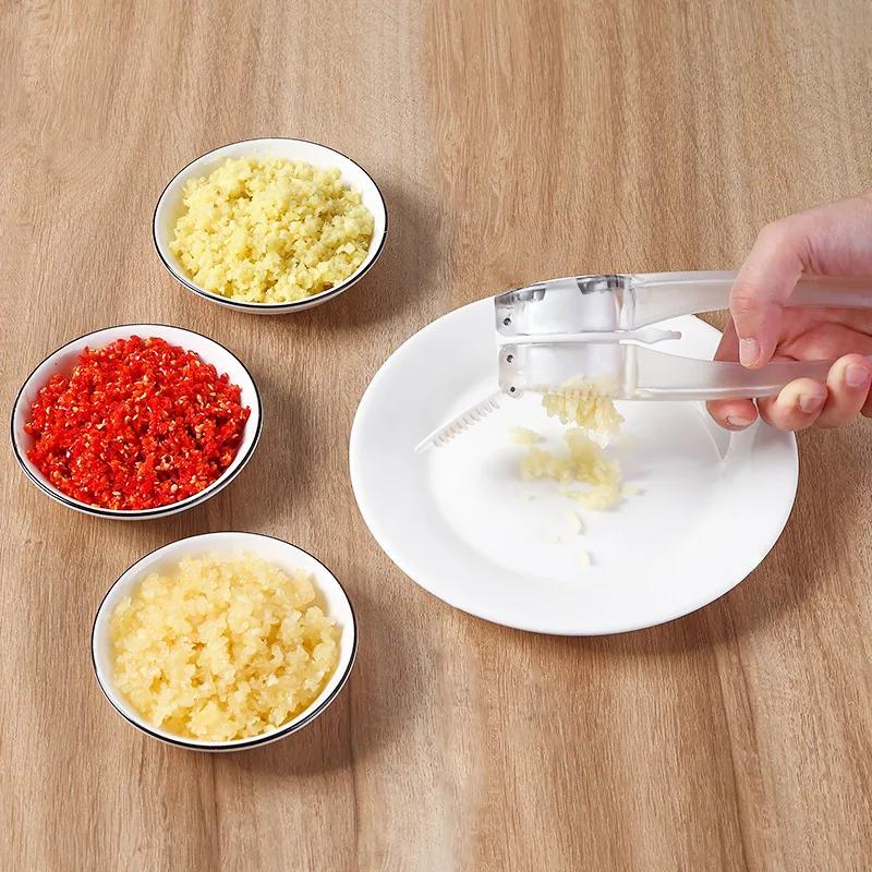 Household manual garlic press creative multi-purpose double-sided garlic slicer kitchen garlic puree small tools wholesale