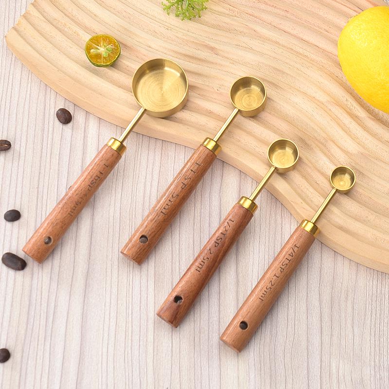 Stainless Steel Gold-Plated Measuring Spoons & Cups with Acacia Wood Handles, Precise Markings, 8-Piece Baking Tool Set.