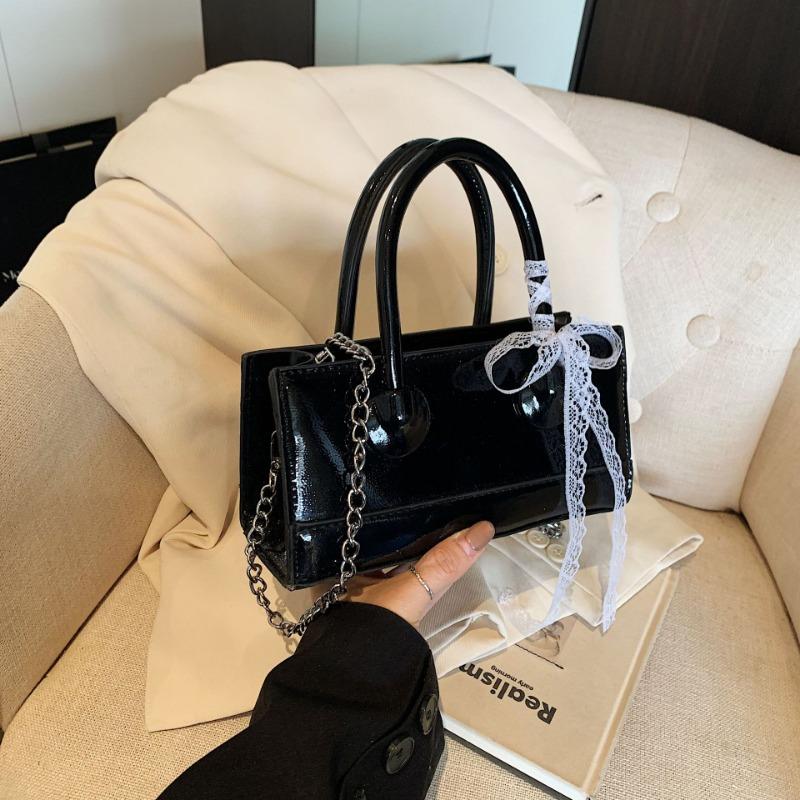 

Spring new high-end bow portable pendant bag fashion trend niche design women s bag чорний