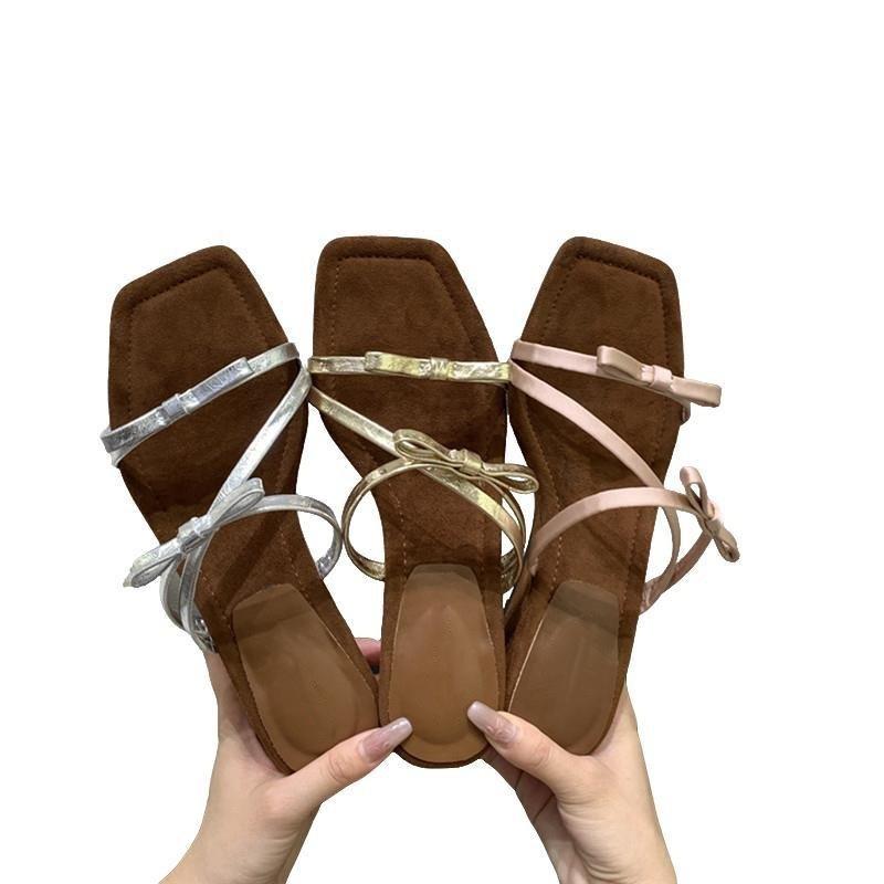 French beautiful bow thick-soled cool slippers women's fashion 2025 summer with skirt one-word wedge slippers