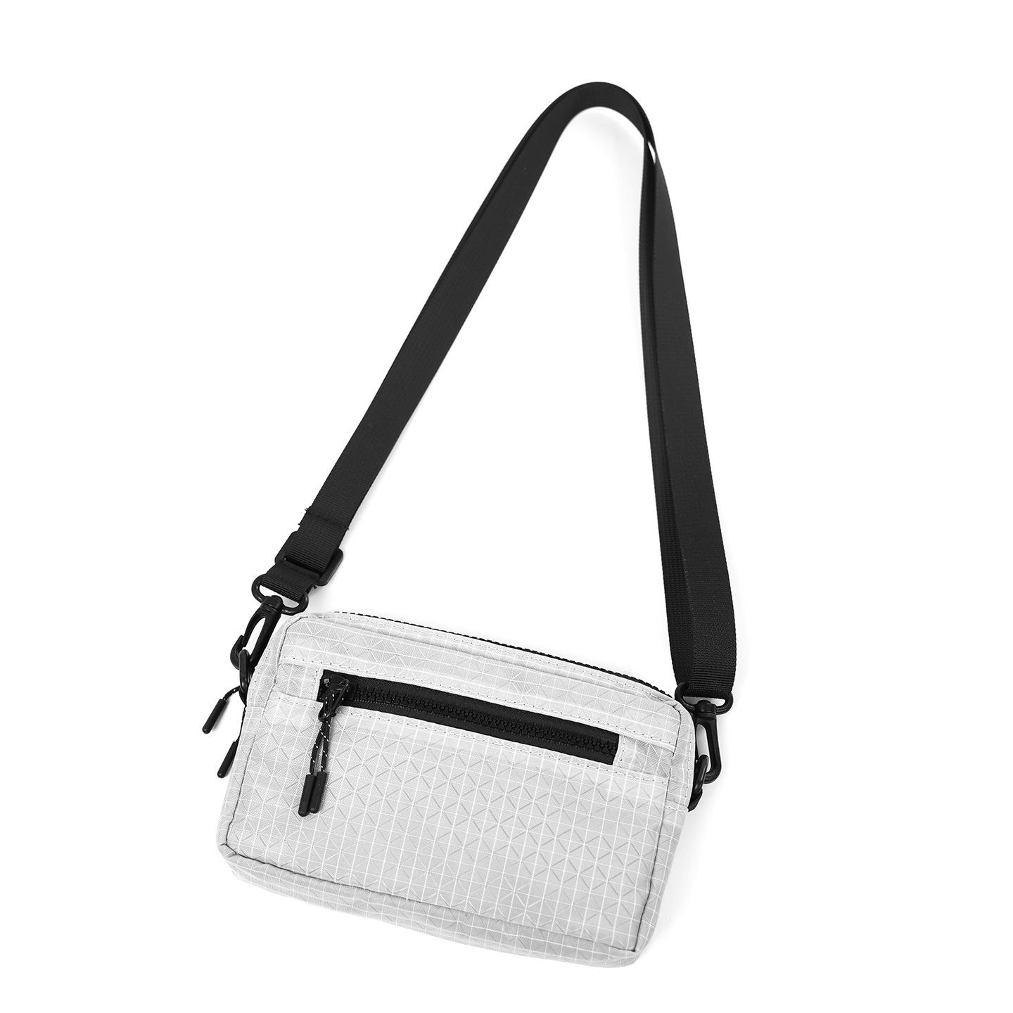 

Niche lightweight messenger bag men s solid color small square bag simple shoulder bag women s lightweight waterproof commuter backpack серый
