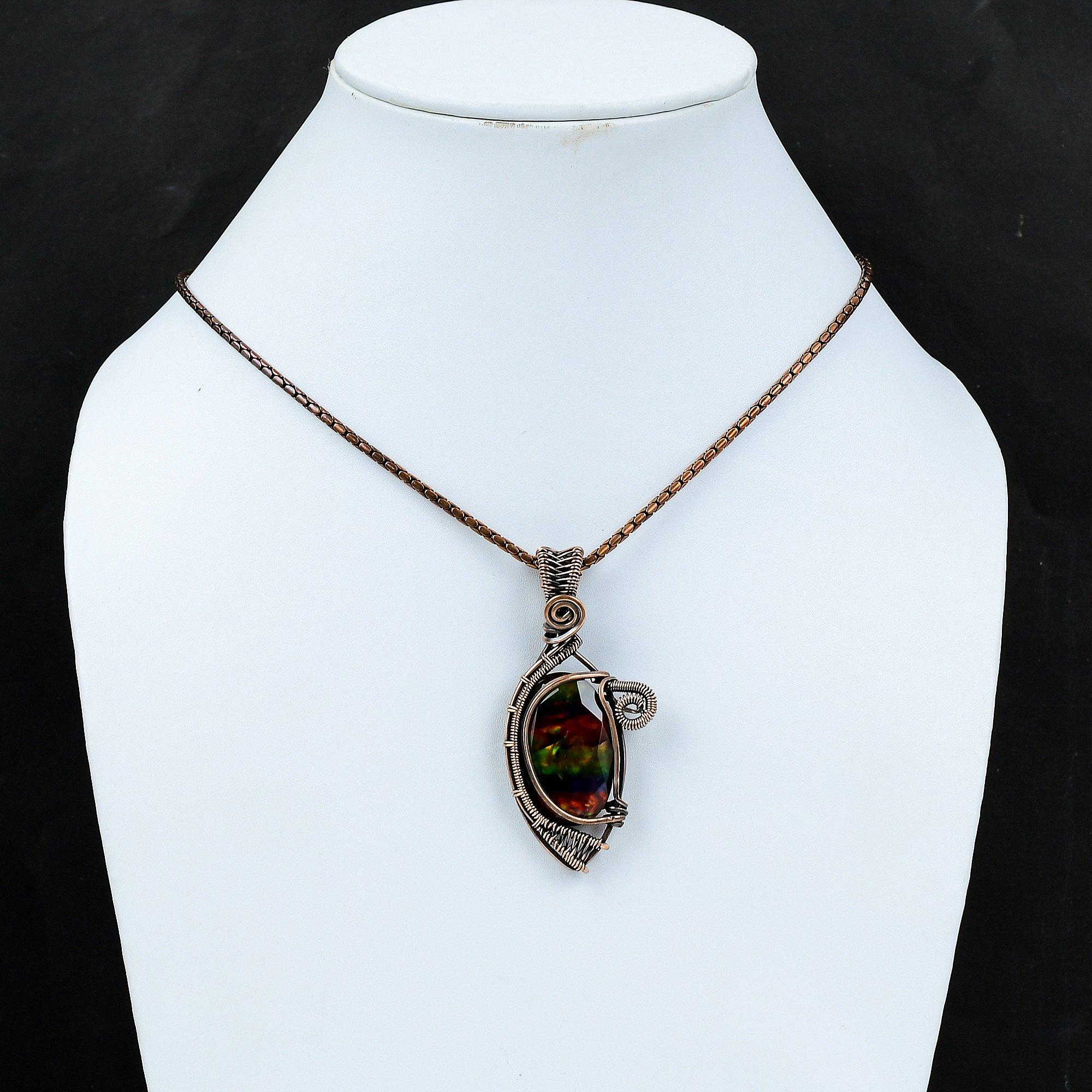 Подвеска из медной проволоки с аммолитовым камнем — фото 6