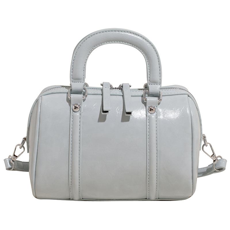 

Весна и лето 2025 новый нишевый простой повседневный портативный саквояж Boston женский для поездок на работу универсальный в иностранном стиле сумка-мессенджер