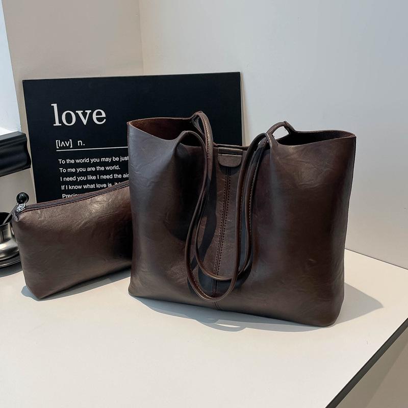 Casual commuter tote bag women's 2025 autumn new personality trendy daily simple temperament shoulder armpit bag
