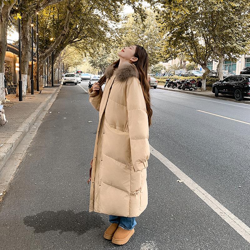 Down cotton-padded clothes, new big fur collar, long knee-length cotton-padded clothes, thickened fashionable winter cotton-padded jacket.