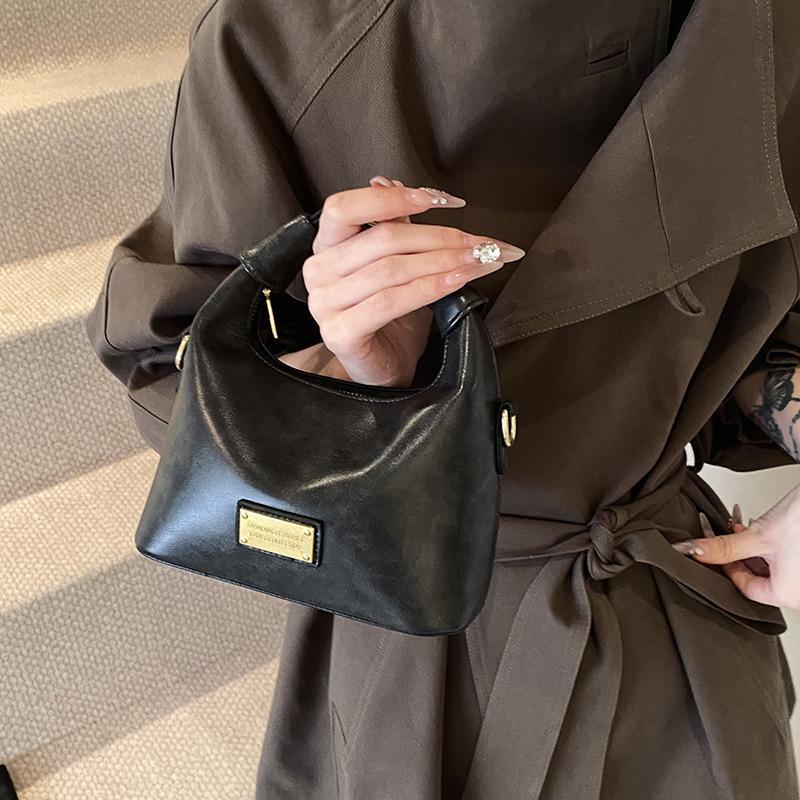 

Женская сумка-мешок в стиле ретро 2024 года на осень — универсальная сумка-мессенджер и сумка-мессенджер Niche 18.5*9.5*20.5 чёрный