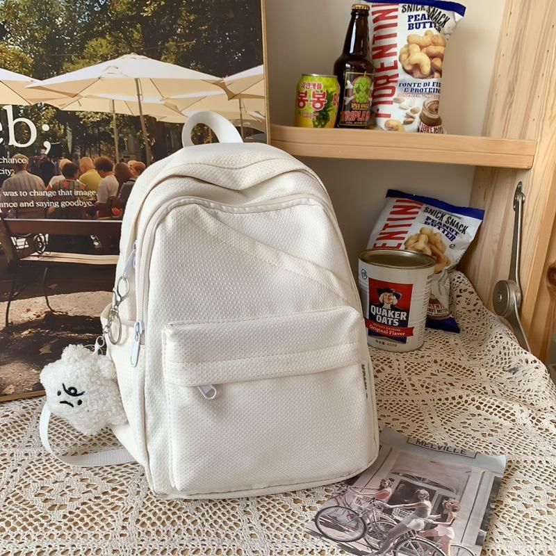 

Однотонный женский рюкзак для школьников белый