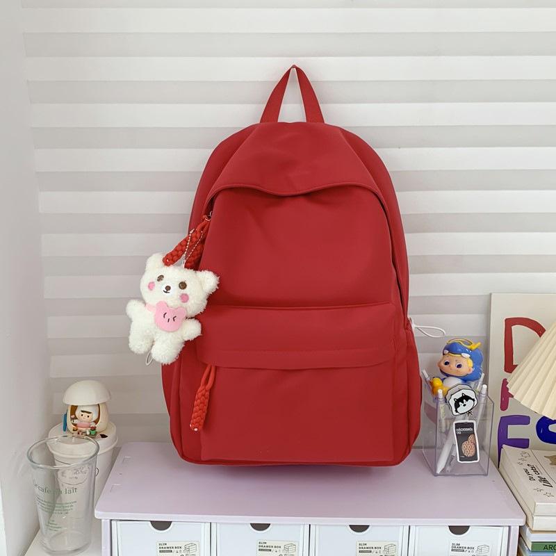 Schoolbag simple solid color schoolbag female Japanese large-capacity backpack junior high school student college student lightweight backpack 