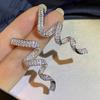 Huitan Rotational Ribbon Shaped Long Hanging Earrings for Women Sparkling CZ Trendy Luxury Female Accessories Creative Zircon