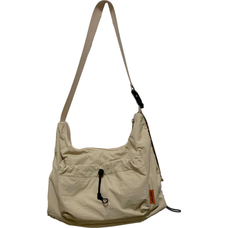 Lightweight casual pleated messenger bag women's trend tooling cotton drawstring shoulder bag Mori simple commuter tote bag