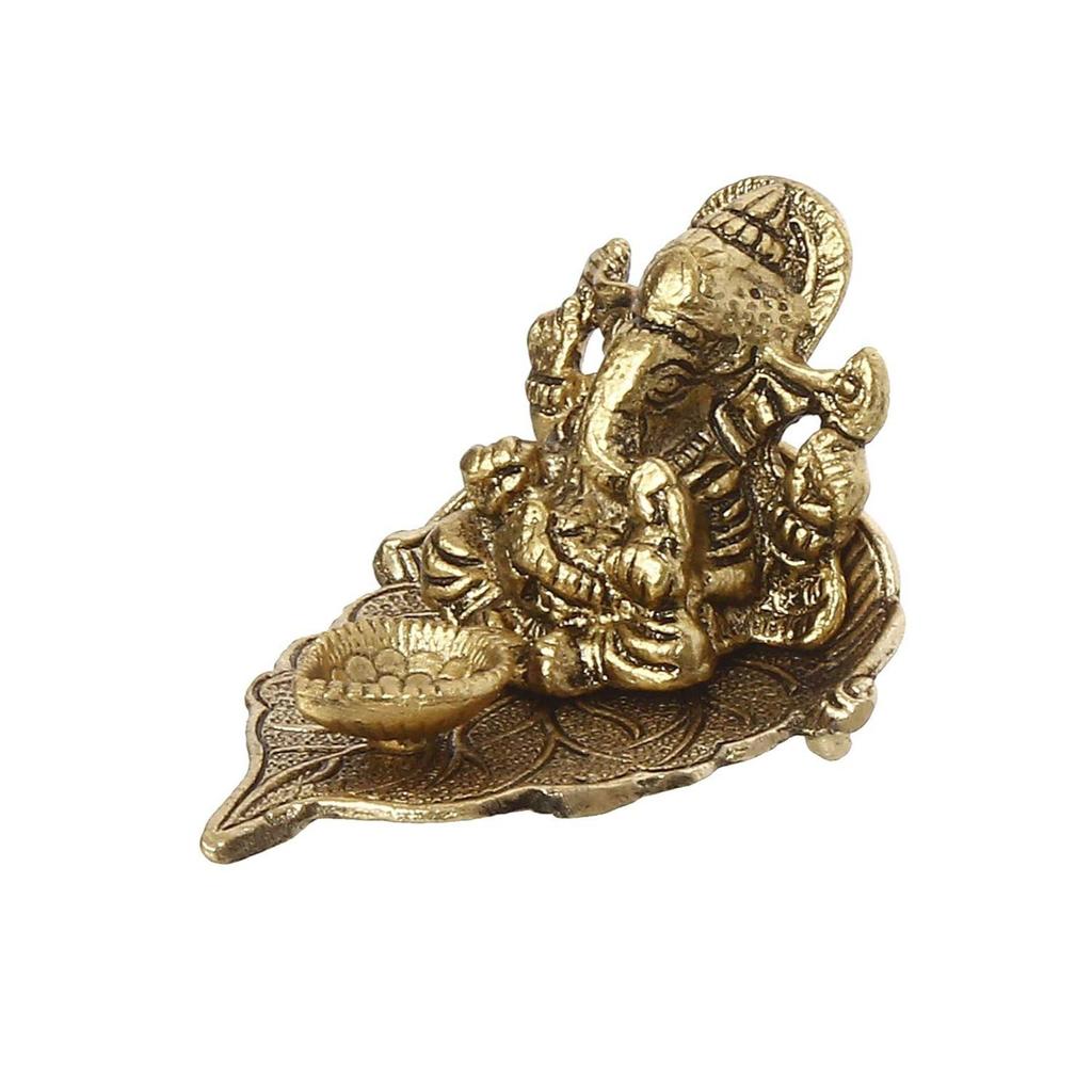 Golden Metal Handcrafted Lord Ganesha Idol with Diya On Leaf - Diya for Diwali, Ganesh Chaturthi - Diwali Diya for Puja Room