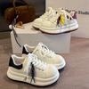 Chaussures blanches McQueen en cuir pour femmes automne 2025 design de niche petite augmentation de hauteur chaussures à semelle épaisse sport et loisirs