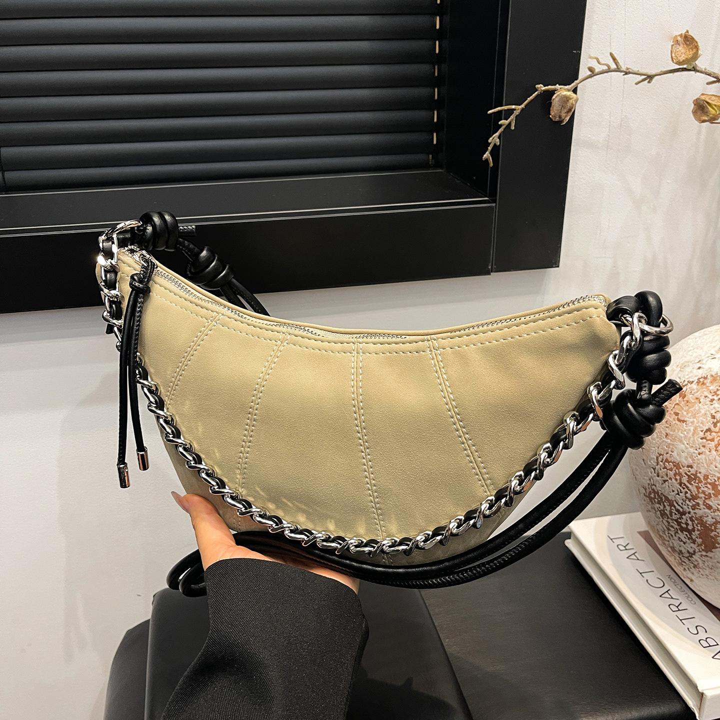 

High-end niche new fashion versatile single shoulder underarm messenger bag commuter dumpling bag tide світло-сірого кольору
