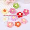 DIY Garnblumen: Handgefertigte gehäkelte Puffblumen-Accessoires zum Lehrertag