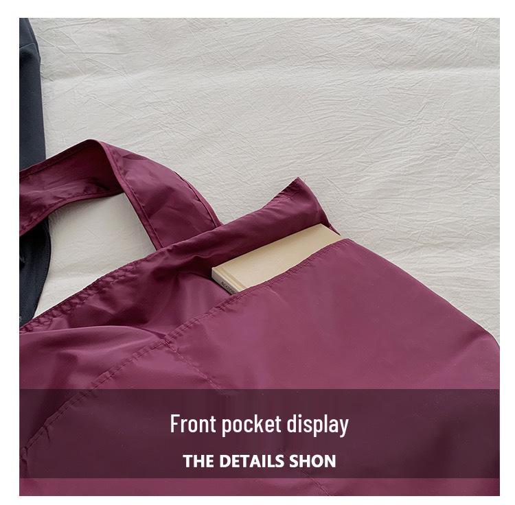 European-American Fashion Large Capacity Travel Bag - Solid Color, Nylon, Handheld or Shoulder Style for Women