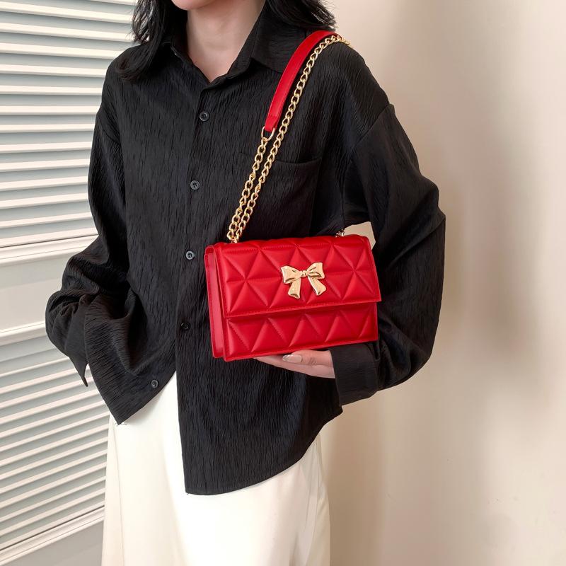 Geantă de mână cu lanț și design de nișă pentru femei, de primăvară, nouă, la modă, cu arc decorativ, cu un singur umăr, cu romb oblic, pătrat